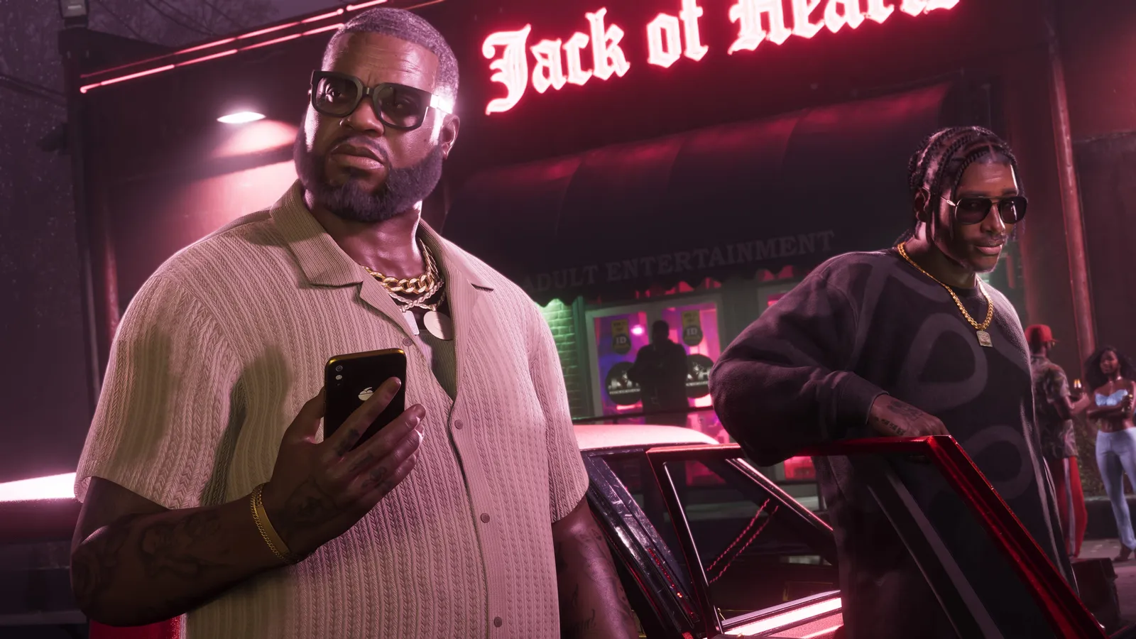 Official GTA 6 screenshot of Boobie Ike standing under the neon Jack of Hearts sign
