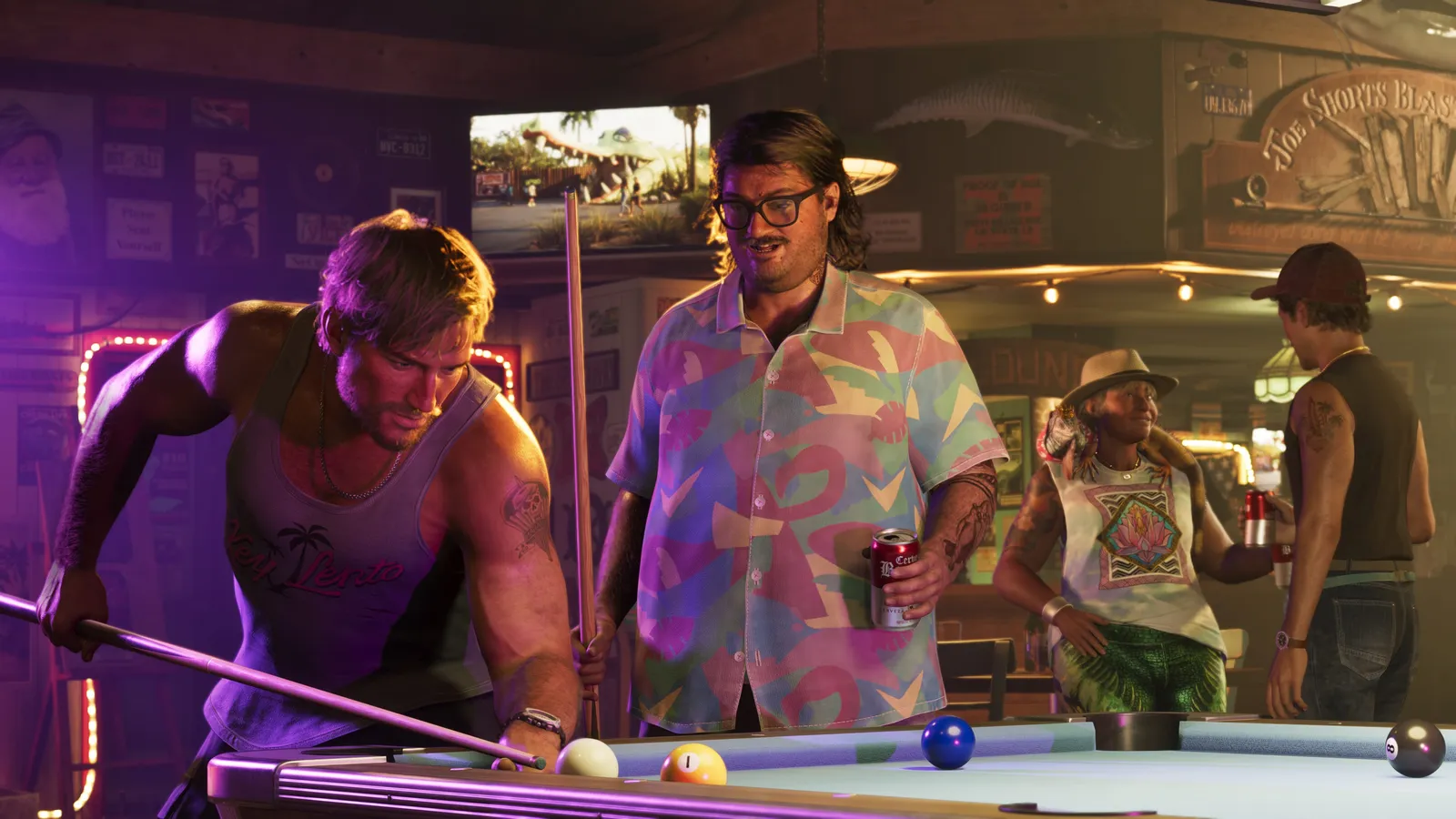A man in a tank top lines up a pool shot in a neon-lit bar while Cal Hampton, in a pastel shirt and glasses, watches with a can in his hand