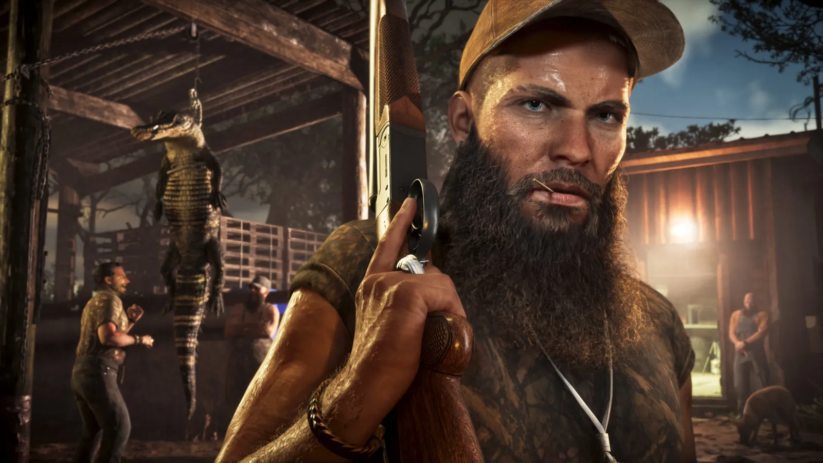 A bearded hunter in a cap stands in a Grassrivers shack with an alligator hanging behind him