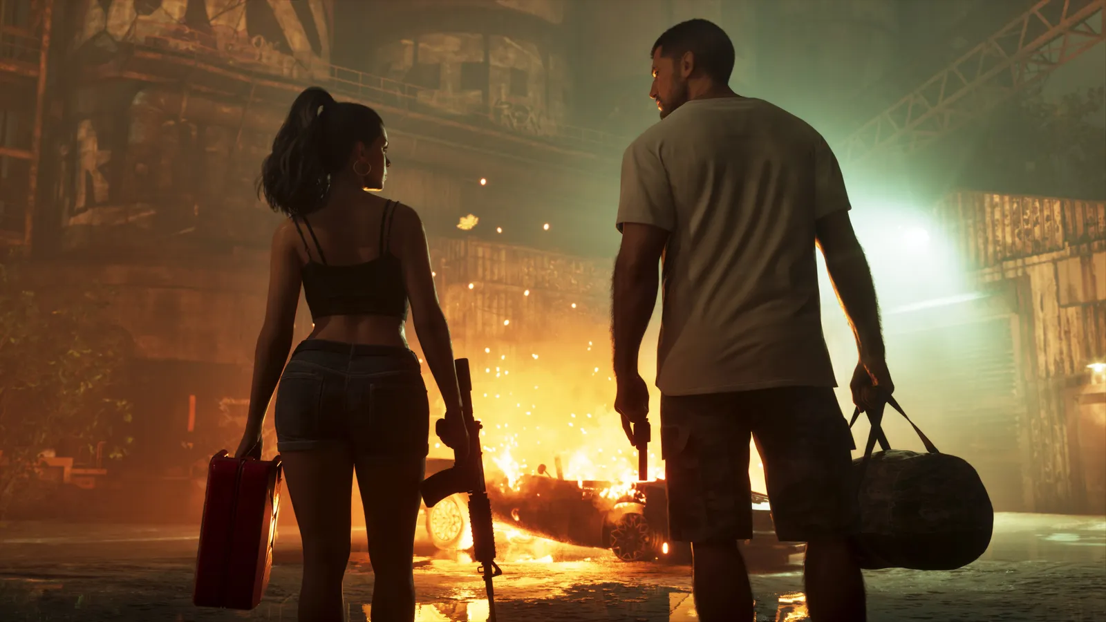 Lucia, carrying a red gas can and a rifle, and Jason, carrying a duffel bag, walk toward a burning car wreck at night