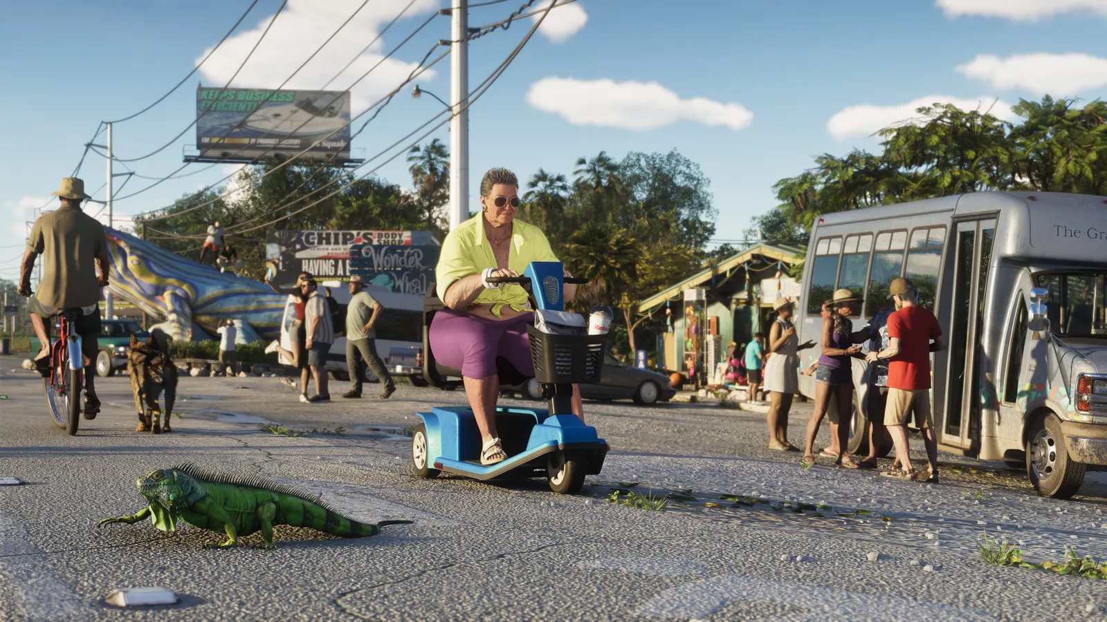 A busy street in the Leonida Keys: an iguana crossing the road, a woman on a mobility scooter, a man cycling with a dog and a crowd beside a shuttle bus
