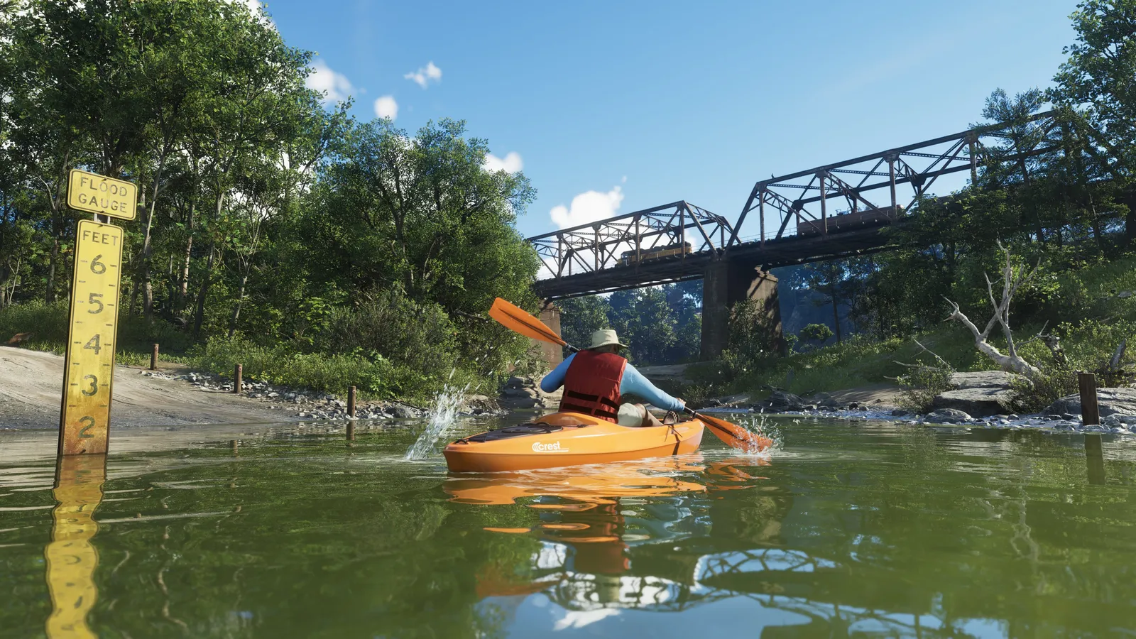 A kayaker paddling down a forest river past a water-level gauge, with a steel railway bridge behind
