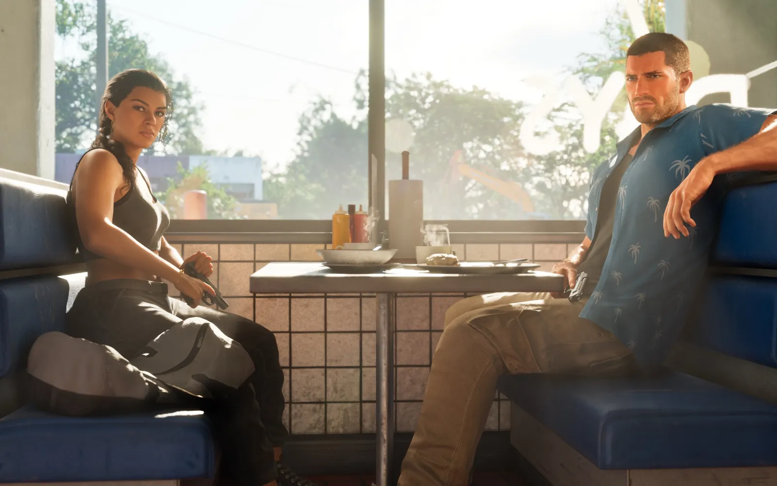 Lucia and Jason sit facing each other in a sunlit diner booth, each holding a pistol under the table